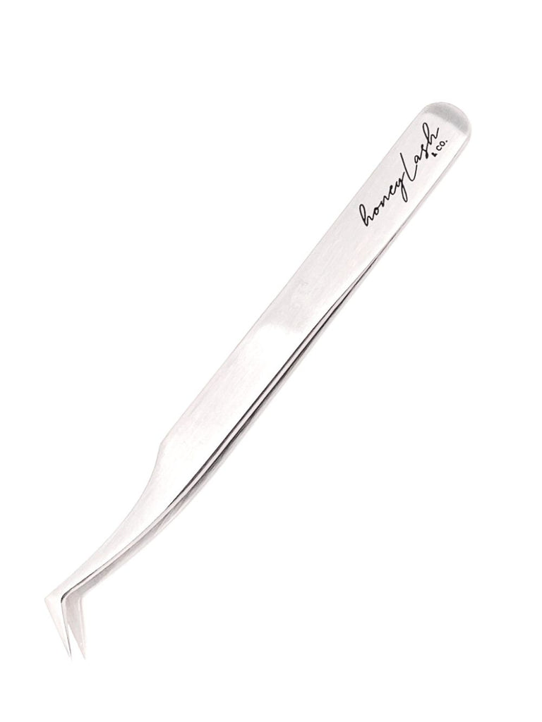 Precision L-shaped tweezer for eyebrow grooming and false eyelash application